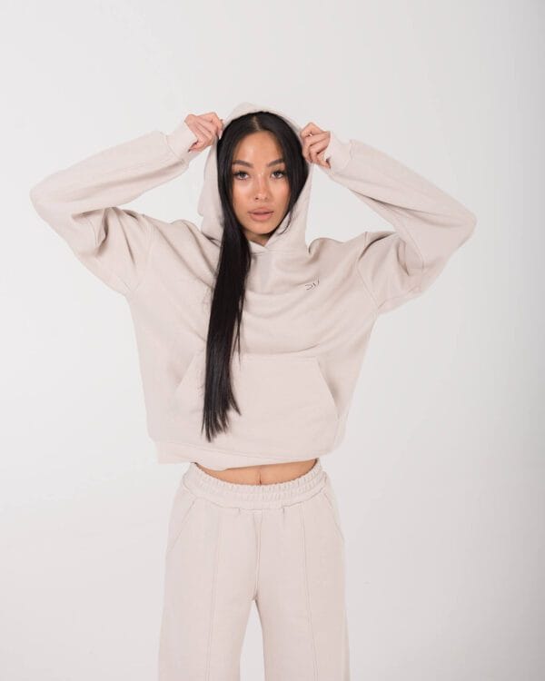 Unisex džemperis su gobtuvu kreminės spalvos